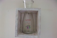 LOVE WINE BOTTLE IN ANTIQUE WHITE BOX. 8 BY 5 BY 4 INCHES.
