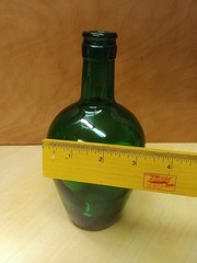 This green glass demijohn bottle