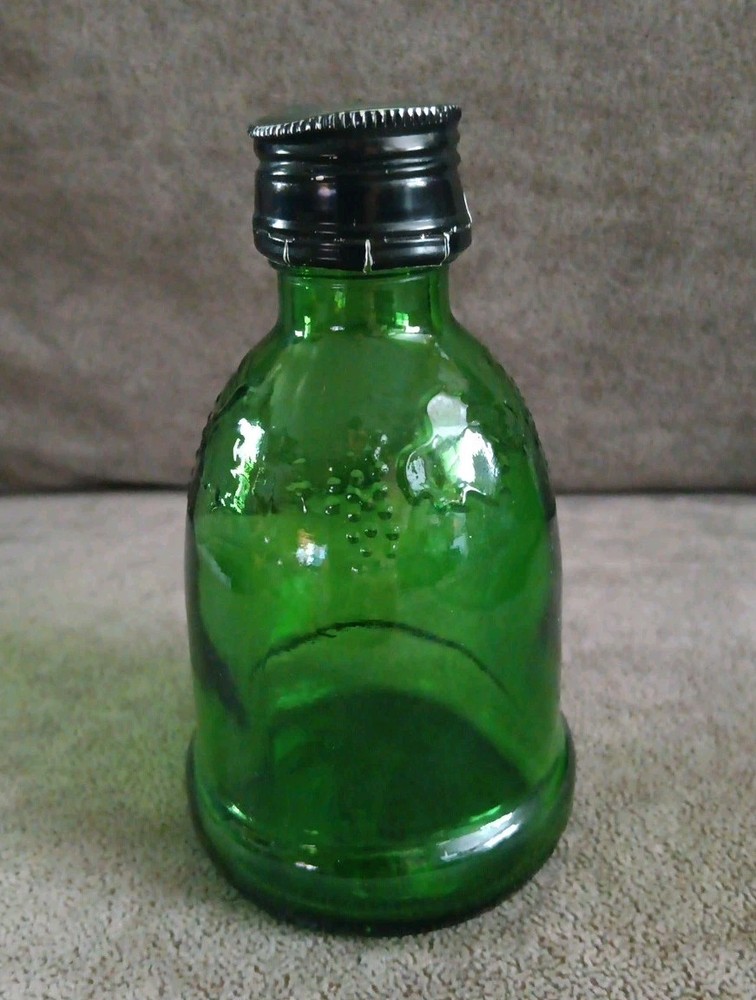 WIne World Vintage Small Green Glass Bottle 1976 embossed grapes screw top cap