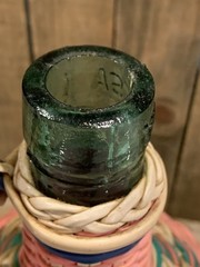 Vintage Green Viresa Glass Bottle Wrapped In Colorful Plastic Wicker 9.5” Tall