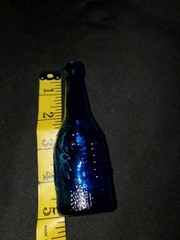 Vintage AM Blue Glass Wine Bottle 5&Prime; Tall Embossed Grapes