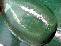 GREEN DEPOSITATO WINE BOTTLE DAMSEL HIPPED RIPPLE GLASS ROUND BOTTOM