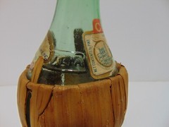 Green Glass Chianti Wine Bottle In Woven Basket 1972 Made In Italy Empty