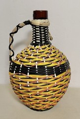 V Levante- Viresa Wine Bottle With Woven Scoubidou Wicker 11” Tall