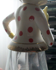 Vintage 1950&rsquo;s clown wine bottle decanter clear glass body ceramic top feet