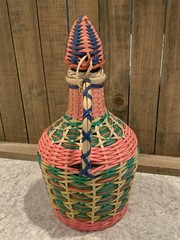 Vintage Green Viresa Glass Bottle Wrapped In Colorful Plastic Wicker 9.5” Tall