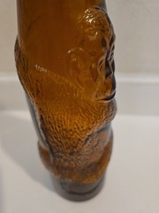 Beautiful Vintage Amber Glass Wine Bottle with Embossed Monkey 14in x 2.75in