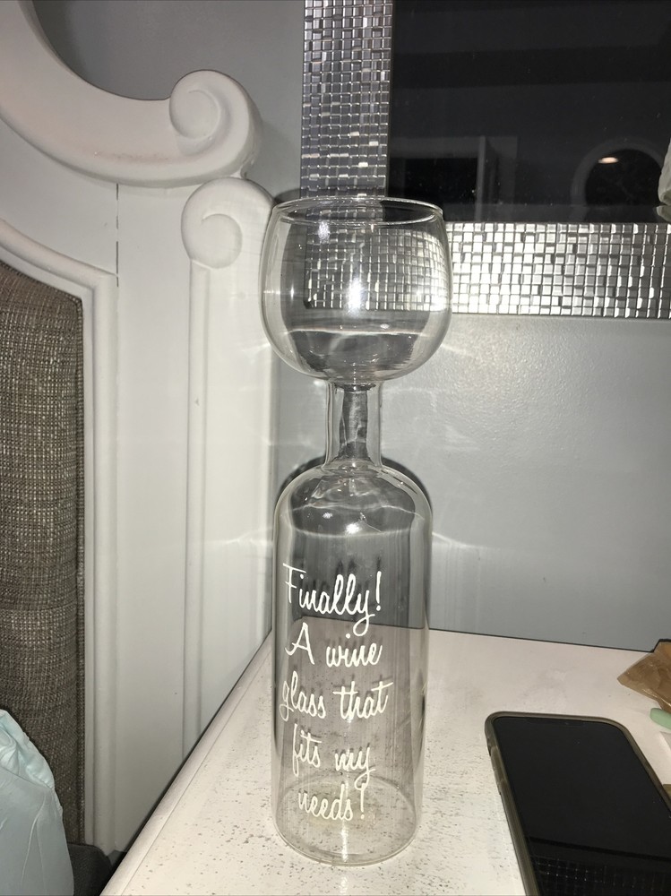 wine bottle with glass made on top , Says A Wine Glass That Fits My Needs. Fun