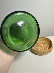 Vintage Glass, Long Neck, Green Bottle With Wickard Base 10 Inches Tall. Nice