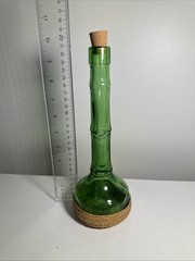 Vintage Glass, Long Neck, Green Bottle With Wickard Base 10 Inches Tall. Nice