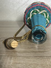 Vintage Spain Wine Bottle Plastic Woven Wicker Metal Handle