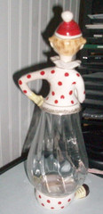 Vintage 1950&rsquo;s clown wine bottle decanter clear glass body ceramic top feet