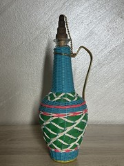 Vintage Spain Wine Bottle Plastic Woven Wicker Metal Handle