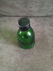 WIne World Vintage Small Green Glass Bottle 1976 embossed grapes screw top cap