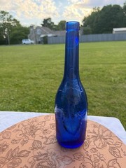 Vintage AM Cobalt Blue Glass Wine Bottle with Embossed Grapes and Leaves