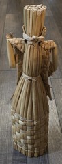 Vintage Wine Bottle Cover Wicker 18” Tiki Statue Playing Instrument