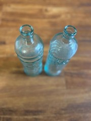 Vintage Embossed Glass Bottles – Set of 2