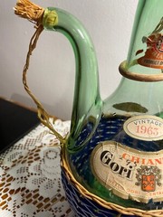 1963 Chianti Italian Wine Green Glass Decanter & Blue Wicker Basket w/labels.
