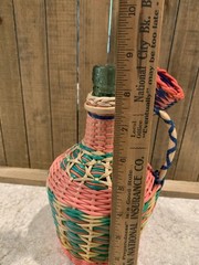 Vintage Green Viresa Glass Bottle Wrapped In Colorful Plastic Wicker 9.5” Tall