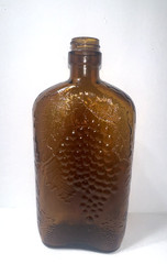 Vintage 1930&rsquo;s Brown Embossed Grape & Leaf & Vine One Pint Wine Bottle Wine Oval